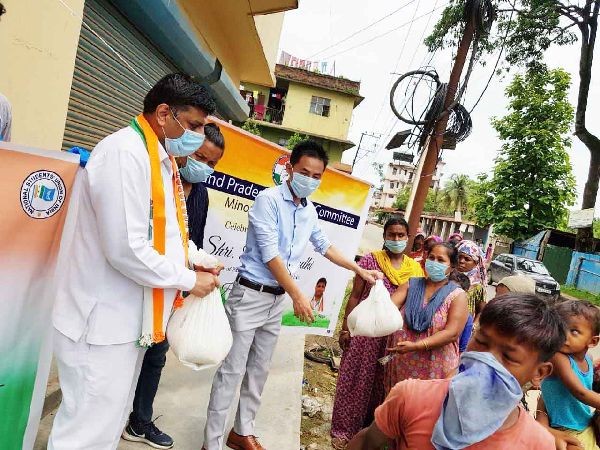 Members of Nagaland Pradesh Congress Committee distribute relief food packets in Dimapur. (Photo Courtesy: NPCC)